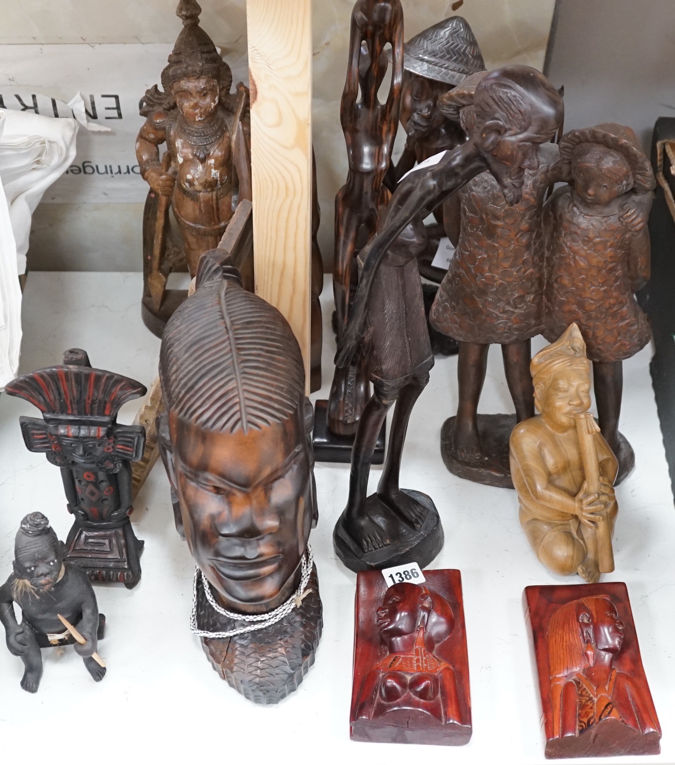 A group of Chinese Asian and African hardwood carvings (a quantity)